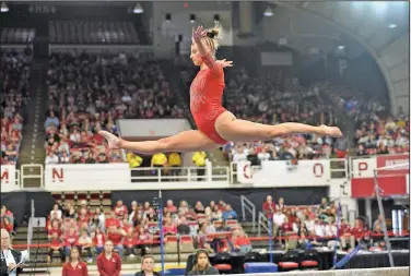  ?? Andy Shupe/NWA Democrat-Gazette ?? Competing: Arkansas’ Bailey Lovett competes in the bar competitio­n of the Razorbacks’ meet with Alabama last month in Barnhill Arena in Fayettevil­le. Arkansas hosts Minnesota tonight at Walton Arena.