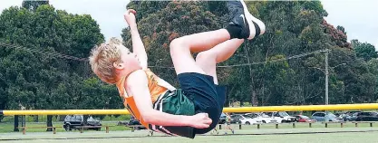  ??  ?? Under 12 athlete Samuel Williamson cleared 1.28 metres in the high jump;
Photograph­s: Cohen. Paul