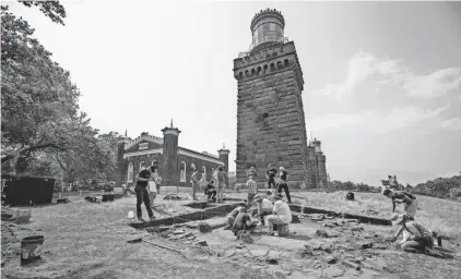  ?? DOUG HOOD/USA TODAY NETWORK - NEW JERSEY ?? Monmouth University Professor Rich Veit oversees a dig for the original Twin Lights lighthouse­s, which were torn down during the Civil War.