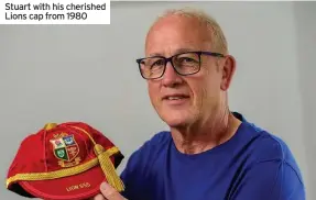  ??  ?? Stuart with his cherished Lions cap from 1980