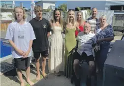  ?? ?? The Family Robinson in Omaha in 2021. From left are Barry’s grandchild­ren Fletcher Bosley, Matthew Robinson, Paige Robinson, Lily Bosley, his children Sally Bosley and Mark Robinson, his wife Coralie and Barry himself (seated).