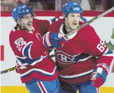  ?? AP PHOTO ?? ROLLING: Phillip Danault (left) celebrates his goal with teammate Andrew Shaw during the Canadiens’ 2-1 victory against the Senators last night in Montreal.