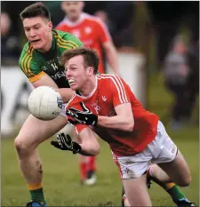  ??  ?? Eimhin Keenan of Louth is tackled by Thomas O’Reilly of Meath.