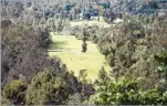  ??  ?? WILSON GOLF COURSE is visible from the path in the southeast area of Griffith Park.