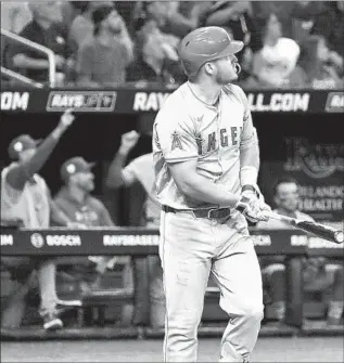 ?? Steve Nesius Associated Press ?? MIKE TROUT watches his two-run homer off Tampa Bay reliever Phil Maton that gave the Angels a 2-1 lead in the eighth inning on Monday in St. Petersburg, Fla. The Angels went on to win 7-3.