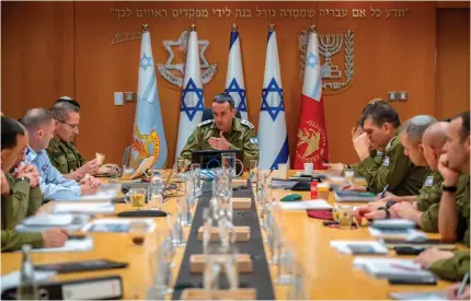  ?? ISRAELI ARMY PHOTO VIA AFP ?? SERIOUS DISCUSSION
Lt. Gen. Herzi Halevi, chief of the General Staff of the Israel Defense Forces, presides over a situationa­l assessment meeting with members of the General Staff Forum at the Kirya military base, which houses Israel’s Defense Ministry, in the western city of Tel Aviv on Sunday, April 14, 2024.