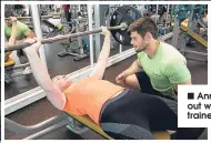  ??  ?? Annette working out with her personal trainer Daniel.