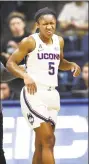  ?? Stephen Dunn / Associated Press ?? UConn’s Crystal Dangerfiel­d (5) winces after getting hit in the second half on Sunday.