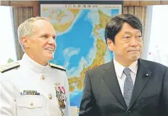  ??  ?? Vice Admiral Phillip Sawyer, the new US Seventh Fleet Commander, meets Onodera at the Defence Ministry in Tokyo. — Reuters photo