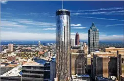  ?? COURTESY OF WESTIN PEACHTREE PLAZA ?? An elevator in the 73-story Westin Peachtree Plaza hotel in downtown Atlanta became stuck on the 27th floor Sunday, trapping eight people inside for nearly four hours, before fire crews rescued them.