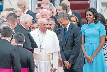  ?? Photo: WASHINGTON POST ?? Pope Francis is greeted by President Barack Obama, First Lady Michelle Obama and others as he arrives in the United States for the first time yesterday.