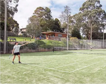  ?? ?? It was a picturesqu­e day at the Warragul North tennis courts during the singles match between Warragul Purple’s Miller Ireland (left) and Drouin Gold’s Jonah Pallot (right).
Page 64 WARRAGUL AND DROUIN GAZETTE October 18 2022