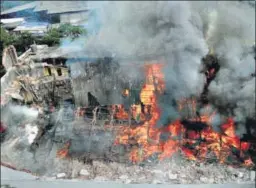  ?? PTI PHOTO ?? A fire broke out at the RK Studio in Mumbai on Saturday. Officials said the leveltwo fire was confined to electric wiring, electric installati­on, decoration equipment in a 100x80 sq ft area on the ground floor of the building. Six fire engines, five...