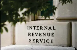  ?? AP PHOTO/ PATRICK SEMANSKY, FILE ?? A sign outside the Internal Revenue Service building is seen, May 4, 2021, in Washington.