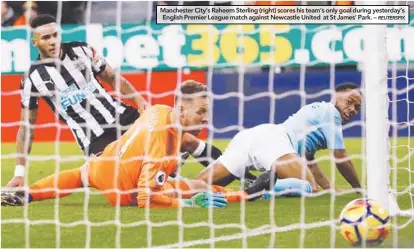  ??  ?? Manchester City’s Raheem Sterling (right) scores his team’s only goal during yesterday’s English Premier League match against Newcastle United at St James’ Park. –