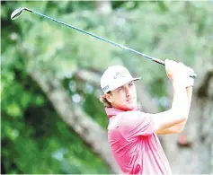  ?? — AFP photo ?? Kelly Kraft follows his tee shot on the 9th hole during round two of A Military Tribute At The Greenbrier held at the Old White TPC course on July 6, 2018 in White Sulphur Springs, West Virginia.