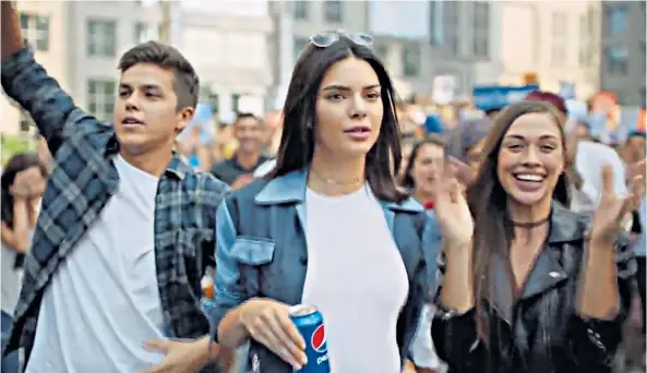  ??  ?? In the fizz: Kendall Jenner’s Pepsi advert, above, which was deemed ‘racially insensitiv­e’, for which the company quickly apologised. Inset: David Dao, who was forcibly removed from a United Airlines flight