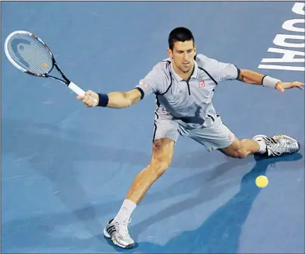  ??  ?? Serbia’s Novak Djokovic returns the ball to his compatriot Viktor Troicki during their ATP Dubai Open tennis match in the Gulf emirate on Feb 26. (AFP)