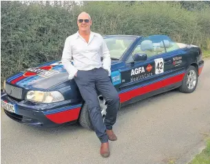  ??  ?? ●● Ed Williams with the car he is using in the Ramshackle Rally