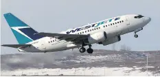  ?? GAVIN YOUNG/FILES ?? Calgary-based WestJet’s new low-cost airline plans destinatio­ns within Canada, the U.S., Mexico and the Caribbean.