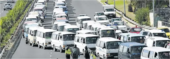  ?? Picture: ESA ALEXANDER ?? BAD OLD DAYS: Cape Town’s N2 highway is jammed in the ’90s during a protest over taxi routes. The first formalisat­ion of the industry was as a result of these fights