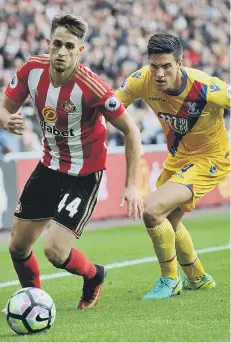  ??  ?? Adnan Januzaj gets the better of Palace’s Martin Kelly