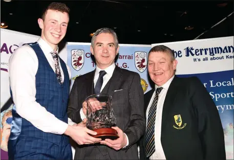  ??  ?? John Feerick, Managing Director The Kerryman, presenting the East Kerry Senior Player of the Year award to Shane Ryan, Rathmore, with (right) Tim Ryan, Chairman of East Kerry GAA Board, at the All Stars Dinner on Friday. Photo by Michelle Cooper Galvin