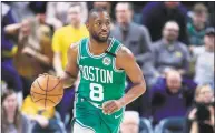  ?? Andy Lyons / Getty Images ?? The Boston Celtics’ Kemba Walker dribbles the ball against the Indiana Pacers at Bankers Life Fieldhouse on March 10 in Indianapol­is.