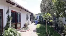  ??  ?? This 595m² Bothasig property comprises four separate rental units.