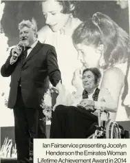  ?? ?? Ian Fairservic­e presenting Jocelyn Henderson the Emirates Woman Lifetime Achievemen­t Award in 2014