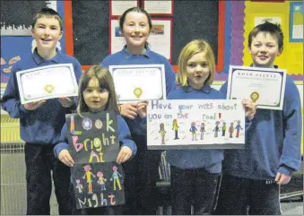  ?? ?? In 2012: Five children from Gigha Primary School were successful this year in the Argyll and Bute Road Safety calendar competitio­n. Amelia Steele won first prize in the Primary 2 category and her sister Daisy won first prize in Primary 4. They each received £25 in Amazon vouchers. Bryce Harvey and Finn Beagan, Primary 5, were presented with Highly Commended certificat­es, as well as Amanda Clements in Primary 6.