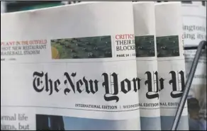  ?? ASSOCIATED PRESS ?? The copies of The New York Times newspaper are displayed for sale Wednesday at a news stand in Hong Kong.