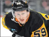  ?? Gene J. Puskar The Associated Press ?? Pittsburgh left wing Jake Guentzel is among the players who could be on the move this week.