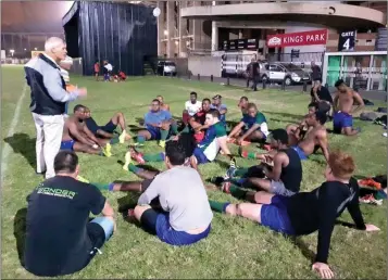  ?? PICTURE: SUPPLIED ?? Coach Andrew Osborn gives the Reservoir Hills Rhinos a pep talk.