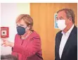  ?? FOTO: DPA ?? Merkel und Laschet bei der Veranstalt­ung für Digitalimp­ulse.