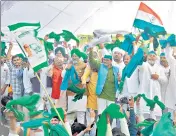  ?? ?? Farmers at the Samyukt Kisan Morcha Mahapancha­yat in Lucknow on Monday.