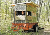  ?? JAY JONES/CHICAGO TRIBUNE ?? Retired executive Sam Wheeler stands inside the deer blind he created for use on his 500 acres of land in rural Clark County, Wisconsin.