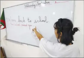  ?? (File Photo/AP/Fateh Guidoum) ?? A teacher gives an English lesson Sept. 21, 2022, at a private school in Birkhadem, Algeria.