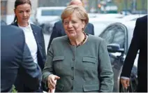  ?? - Reuters ?? ELATED: Angela Merkel, leader of the Christian Democratic Union (CDU), arrives at the German Parliament­ary Society offices before the start of explorator­y talks about forming a new coalition government in Berlin, Germany November 10, 2017.