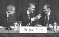  ?? CHRIS YOUNG/THE CANADIAN PRESS ?? Brookfield CEO Bruce Flatt, centre, with colleagues at the annual general meeting in Toronto. Toronto-based Brookfield’s $Us11.4-billion deal for Forest City is seen as “a positive.”