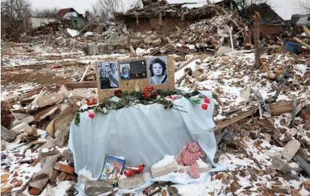  ?? — AFP photo ?? Portraits displayed during a funeral ceremony at a site destroyed by a Russian missile strike, in Kramatorsk, Donetsk region amid the Russian invasion of Ukraine.