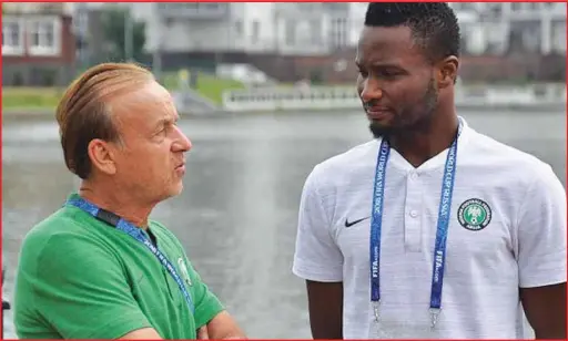  ??  ?? Captain of the Super Eagles Mikel Obi in a chat with Coach Rorh
