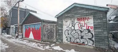  ?? ANDREW FRANCIS WALLACE TORONTO STAR ?? A garage at 62 Croft St., a laneway near College and Bathurst streets, is for sale for just under $1 million.