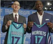  ?? CHUCK BURTON — THE ASSOCIATED PRESS, FILE ?? In this June 23, 2015, photo, NBA commission­er Adam Silver, left, and Charlotte Hornets owner Michael Jordan, right, pose for a photo during a news conference to announce Charlotte, N.C., as the site of the 2017 NBA All-Star basketball game. The NBA is...