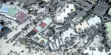  ?? THE CANADIAN PRESS FILES ?? This Sept. 6, 2017 photo provided by the Dutch Defense Ministry shows storm damage in the aftermath of Hurricane Irma, in St. Maarten.