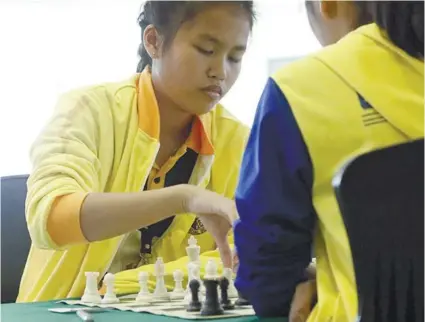  ?? CONTRIBUTE­D FOTO/CEBU PROVINCE SPORTS COMMISSION ?? DOUBLE GOLD. Marian Calimbo won two gold medals for Cebu Province after topping the rapid and blitz chess events.