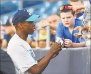  ?? Gregory Vasil / For Hearst Connecticu­t Media ?? Dwight Gooden signs autographs prior to the start of the Bridgeport Bluefish 20th Anniversar­y Legends Game at the Ballpark at Harbor Yard on August 5, 2017 in Bridgeport.