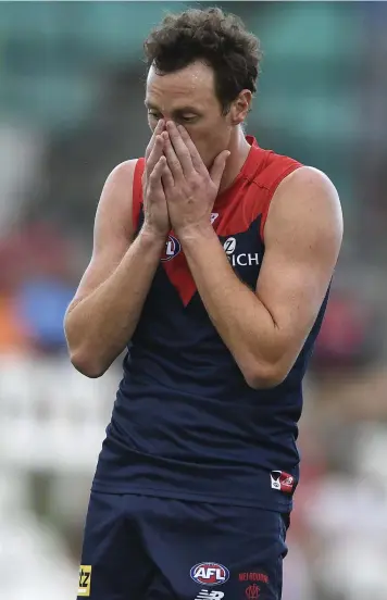  ?? Picture: IAN HITCHCOCK/GETTY IMAGES ?? FLAT: Melbourne’s Mitch Brown struggled to take advantage of his side’s strong midfield work as the Demons went down to the Swans at Cazalys Stadium on Thursday.