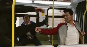  ??  ?? Awkwafina and Liu face attackers in a fight and car chase scene shot in a San Francisco bus that was re-created on a soundstage in Australia.