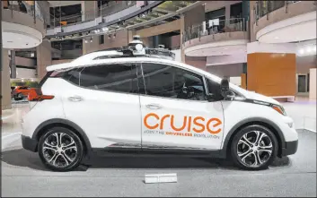  ?? Paul Sancya The Associated Press ?? Safety regulators are investigat­ing reports that autonomous robotaxis run by Cruise LLC can stop too quickly or unexpected­ly stop moving.